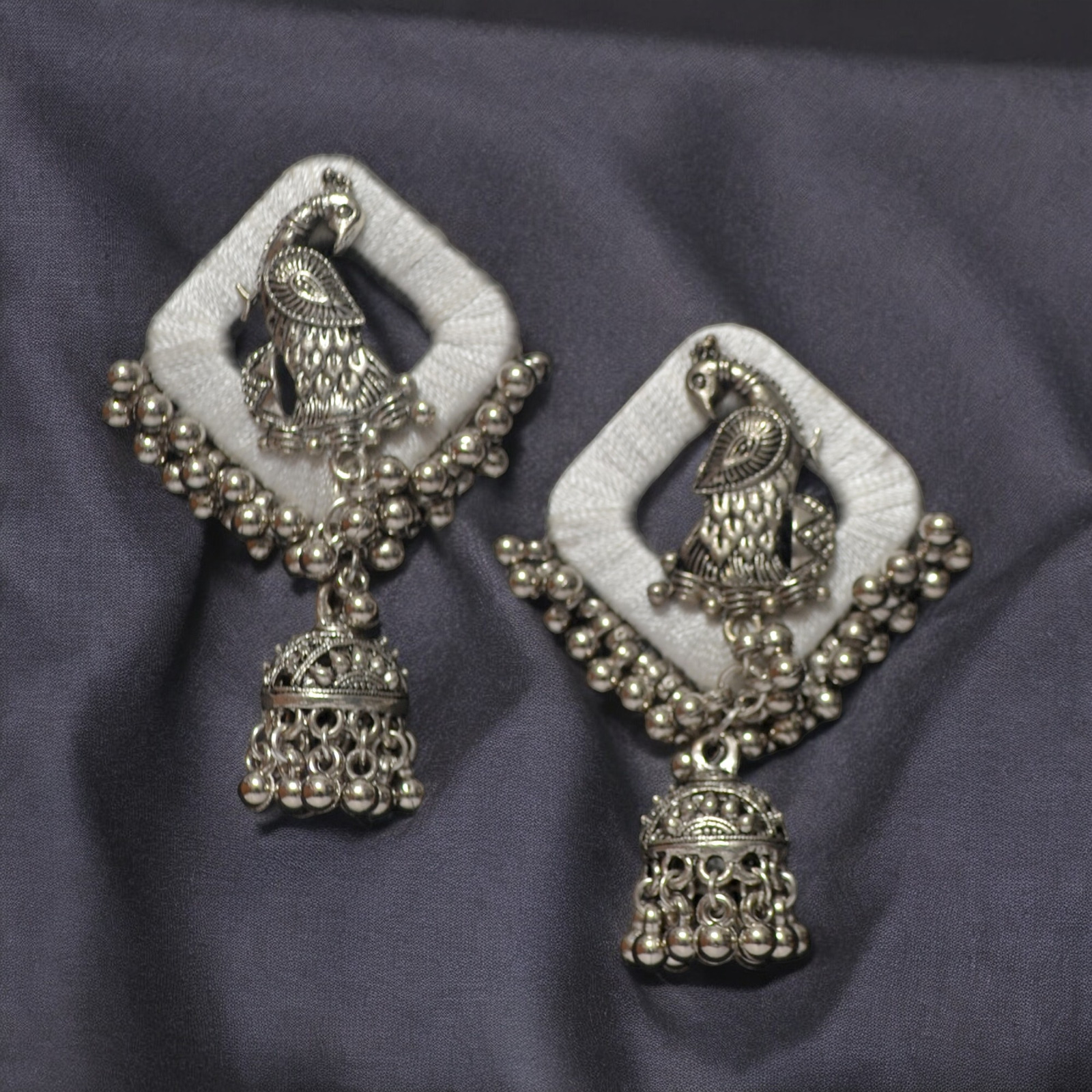 AANYAAS Trendy Silk Oxidised Peacock Jhumka Earrings with Purple Silk Base, Silver Motifs, and Decorative Beads, Perfect for Fashion Enthusiasts and Special Occasions